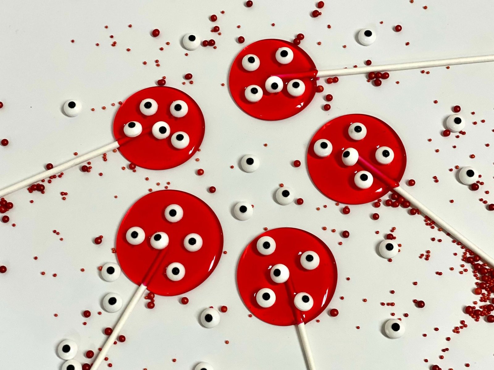 Espolvorea ojos rojos piruletas de halloween caramelos duros hechos a mano personalizados