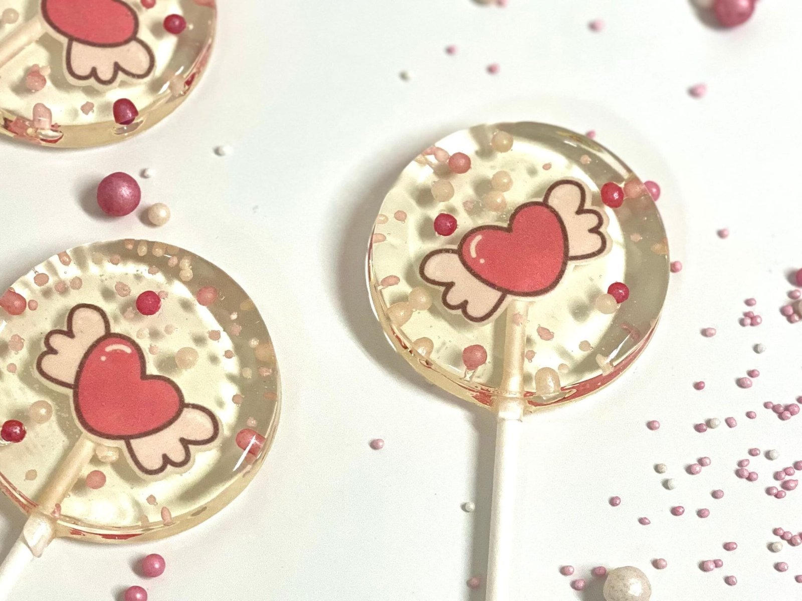 Piruletas de corazón alado de San Valentín, caramelo duro hecho a mano sin azúcar